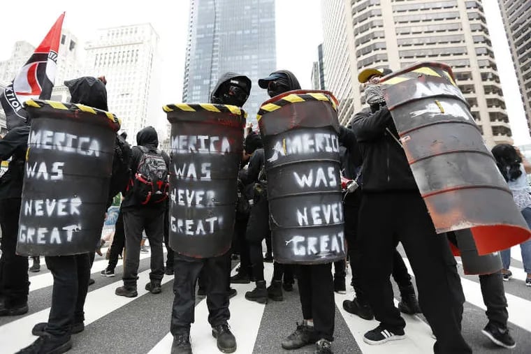 Leftist activists attend a spring protest in Philadelphia.