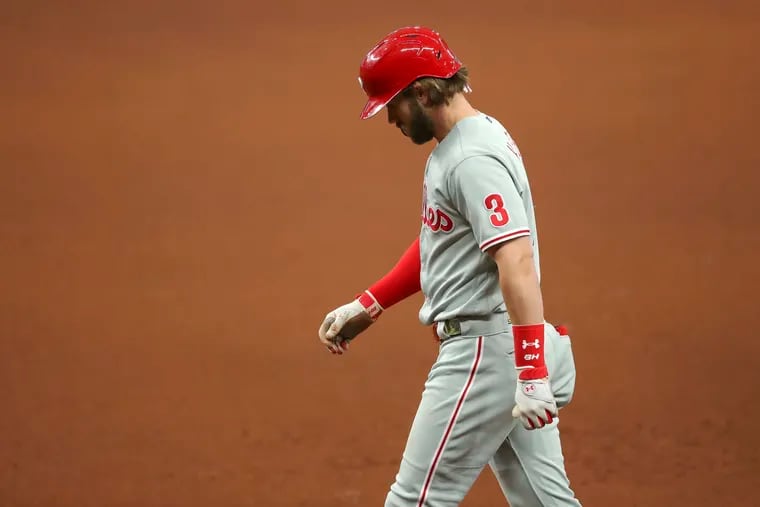 Bryce Harper grounds out against the Tampa Bay Rays during the eighth inning of the Phillies' 5-0 loss in Sunday's season finale.