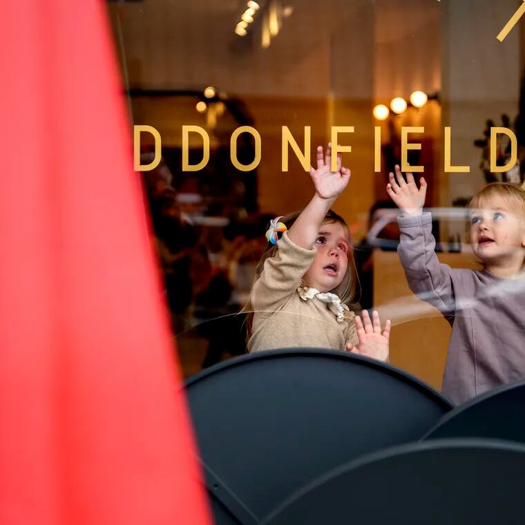 Three year-old friends Lola Browne and Madelyn Turner (right) examine the letters in the storefront window of Cafe Lift as they wait inside for brunch with their mothers in Haddonfield, N.J. Owners Michael and Jeniphur Pasquarello opened the original Cafe Lift in Philadelphia’s Callowhill neighborhood in 2003. Scene Through the Lens runs every Monday on page B-2. There is a template in Roxen. This sentence runs at the top of the photo: More of photographer Tom Gralish’s visual exploration of our region can be seen in his blog at Inquirer.com/sceneontheroad.