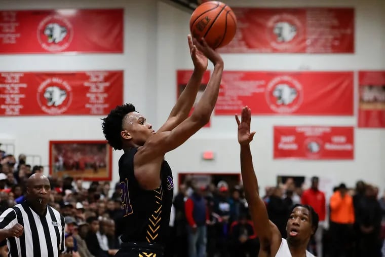 Camden High's D.J. Wagner, shown here last season as a freshman shooting over Roman Catholic's Justice Williams, will lead the Panthers into the 2021 HoopHall Classic and a game vs. Sierra Canyon of Los Angeles, which features Bronny James, the son of LeBron James.