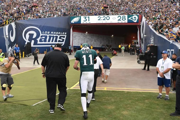Philadelphia Eagles quarterback Carson Wentz walks off the field after injuring his leg against the Los Angeles Rams on Sunday, Dec. 10, 2017 at the Coliseum in Los Angeles, Calif. (Wally Skalij/Los Angeles Times/TNS)