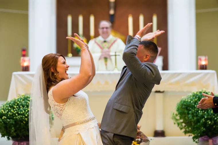 When pronounced husband and wife, Courtney Hoffer and Joe McClernon congratulated each other as they always do — with a high five.
