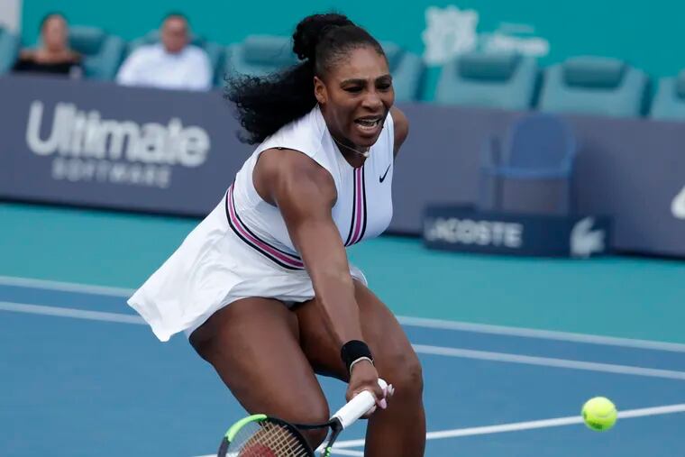 Serena Williams returns to Rebecca Peterson, of Sweden, during the Miami Open tennis tournament, Friday, March 22, 2019, in Miami Gardens, Fla.