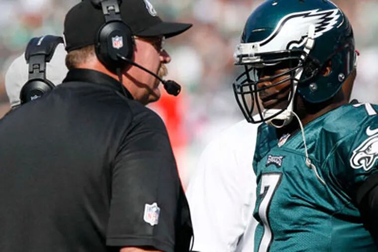 Andy Reid is under as much pressure to keep his job as quarterback Michael Vick. (Yong Kim/Staff Photographer)