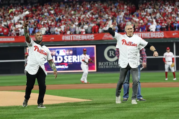 Phillies greats Jimmy Rollins (left) and Chase Utley throw out the ceremonial first pitch ahead of Game 4 of the 2022 World Series. They're both on the ballot for the Baseball Hall of Fame.
