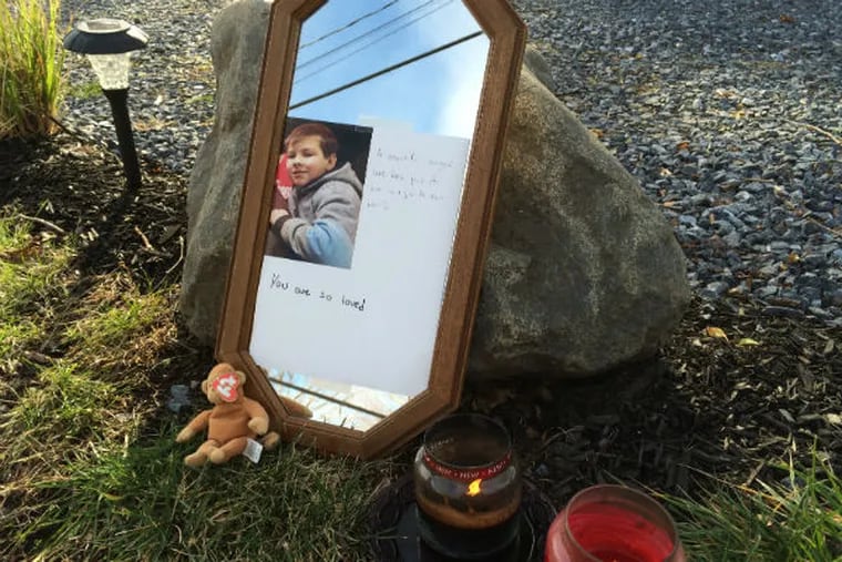 A small memorial left outside a house on Delsea Drive, between Elmer and Paul Streets. (Angelo Fichera / Staff)