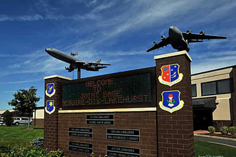A sign at the McGuire Air Force Base announces the coming Joint Base McGuire-Dix-Lakehurst. The nation's only contiguous triservice megabase will take its new name on Thursday. ( Sharon Gekoski-Kimmel / Staff )