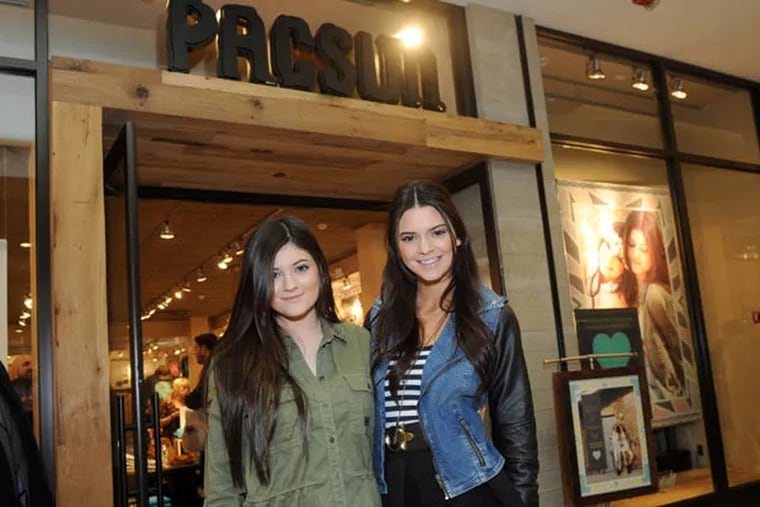 FILE - This Feb. 8, 2013 file photo released by PacSun shows sisters Kendall, right, and Kylie Jenner at the launch their Kendall & Kylie collection on Long Island, N.Y.  Kendall, 17, and Kylie, 15, has teamed up with PacSun to put out clothes aimed at teen girls. (AP Photo/PacSun, Diane Bondareff, file)