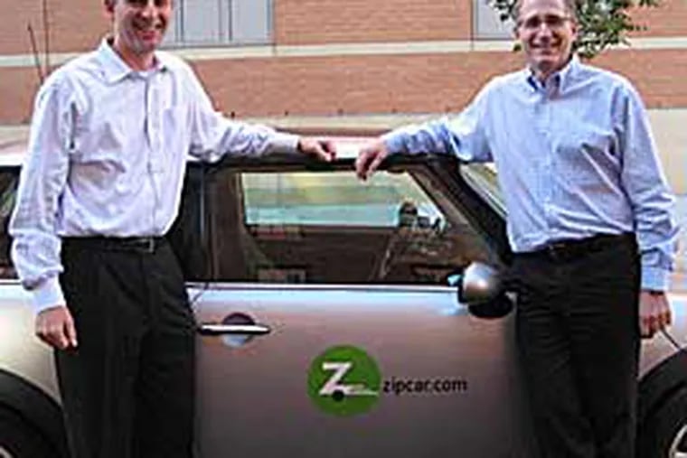 From left: Mark Norman, president and COO of Zipcar, and Scott Griffith, CEO. The for-profit carsharing company, is challenging Philadelphia-based nonprofit PhillyCarShare for city government business and local market leadership.