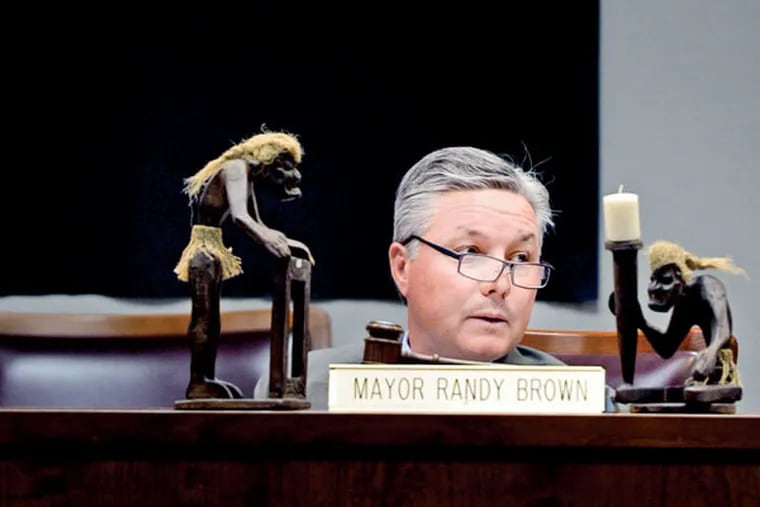 Evesham Mayor Randy Brown presides over the council meeting March 17, 2015. ( TOM GRALISH / Staff Photographer )