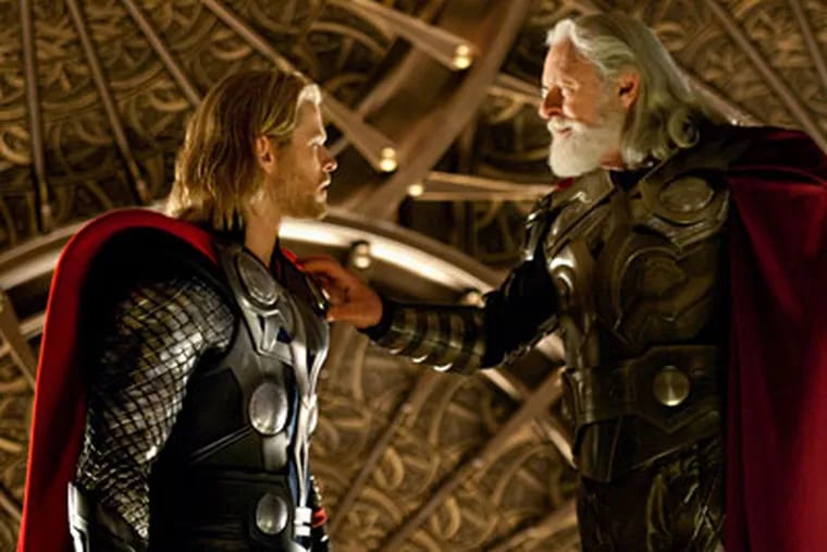 Chris Hemsworth, left, and Anthony Hopkins are shown in a scene from the film, "Thor." (AP Photo / Paramount Pictures-Marvel Studios, Zade Rosenthal)