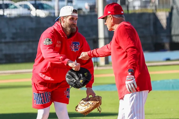 Bryce Harper works out each morning with the Phillies infield coaches, including former shortstop and manager Larry Bowa.