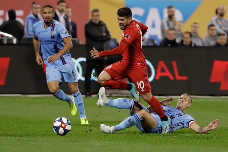 Alejandro Pozuelo (10) scored twice to give No. 4 seed Toronto FC a 2-1 upset win over No. 1 seed New York City FC Wednesday night at Citi Field in the first Eastern Conference semifinal.