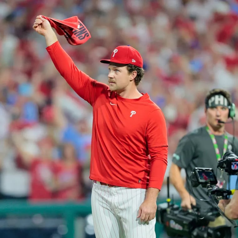 Rhys Hoskins threw the ceremonial first pitch before Game 1 of the Phillies' wild-card series at Citizens Bank Park.