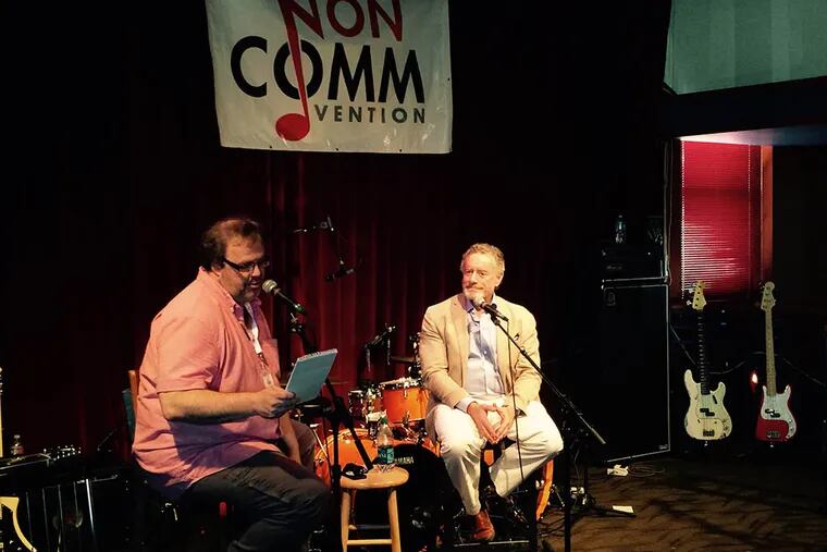 NPR president Jarl Mohn (right) in conversation with WXPN’s Dan Reed. “One of the things that helps me with this job is that I don’t really need it,” Mohn says.