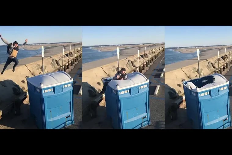 A screenshot of a viral video featuring Robert Daniels, 26, of Philadelphia jumping into a portable toilet in North Wildwood.