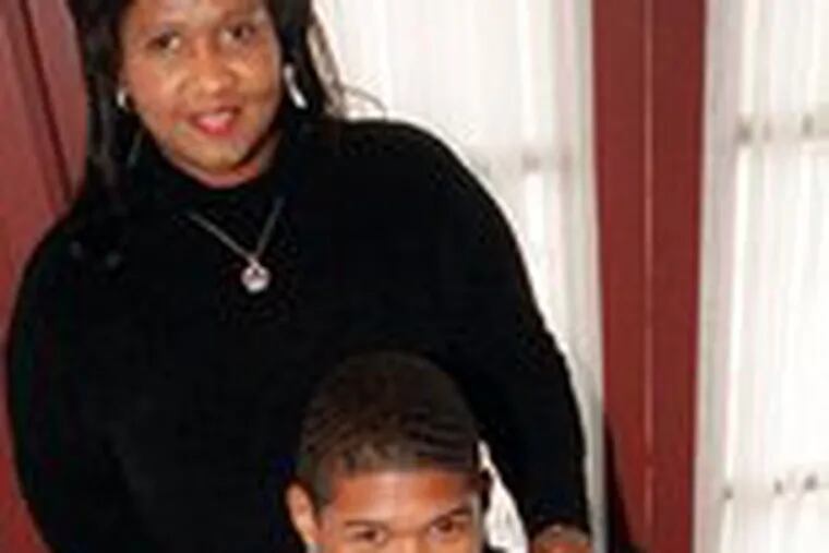 Singer Usher with his mother, Jonnetta Patton, in 1999. Usher says his mother is no longer his manager, but denies a rift.