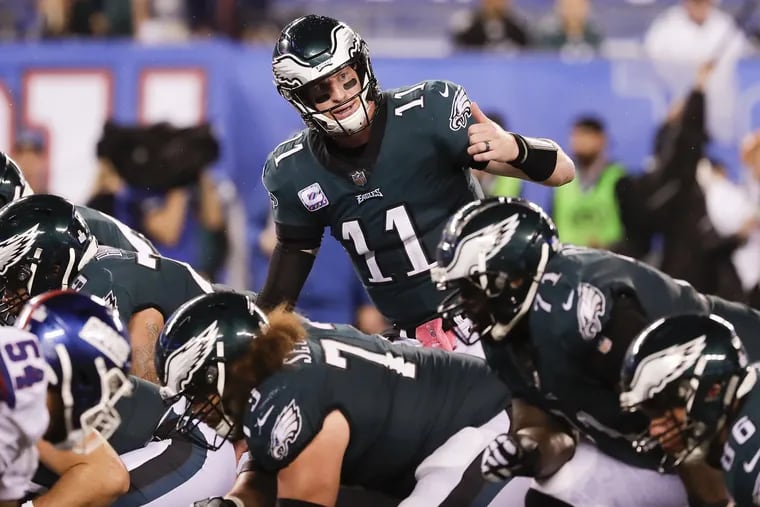 Carson Wentz completed 13 of 14 passes on third down for 167 yards and two touchdowns in the Eagles' win over the Giants.