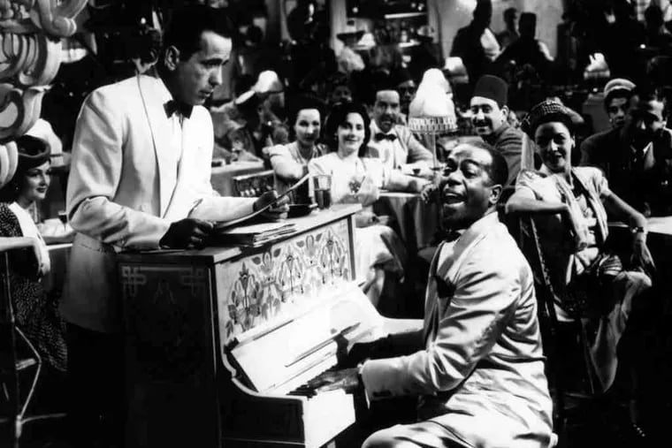 Humphrey Bogart and Dooley Wilson at the piano in the 1942 drama &quot;Casablanca.&quot; The club - Rick's - is among memorable cinema nightclubs. Many others are in musicals.