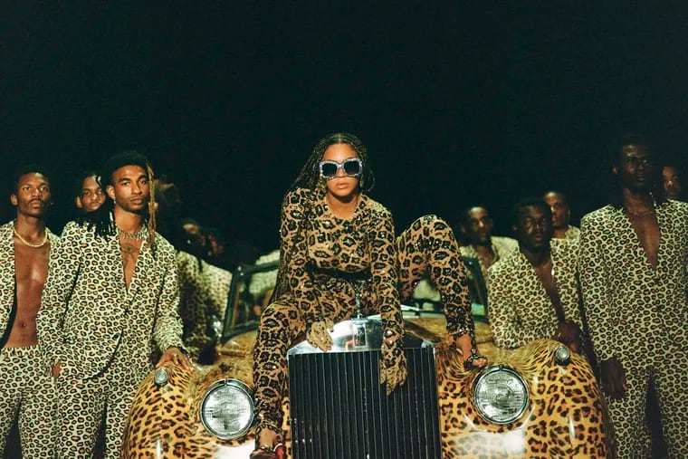 Beyoncé Knowles, center, in a scene from her visual album "Black is King."