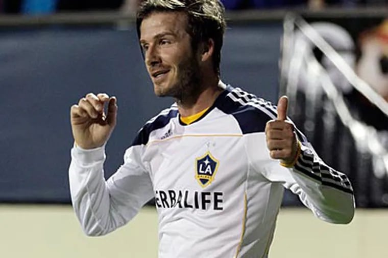 David Beckham and the Galaxy host the Union on Saturday night. (Gregory Bull/AP file photo)