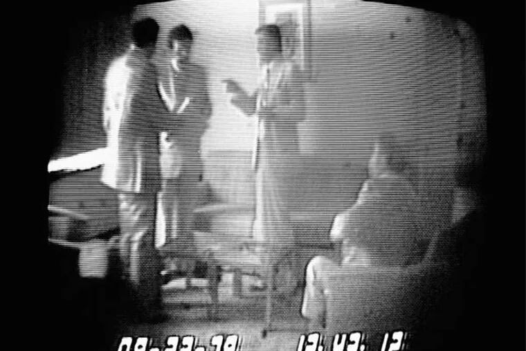 In 1980 (from left), FBI agent Anthony Amoroso talks with U.S. Rep. Michael Myers, Camden Mayor Angelo Errichetti, and Mel Weinberg.