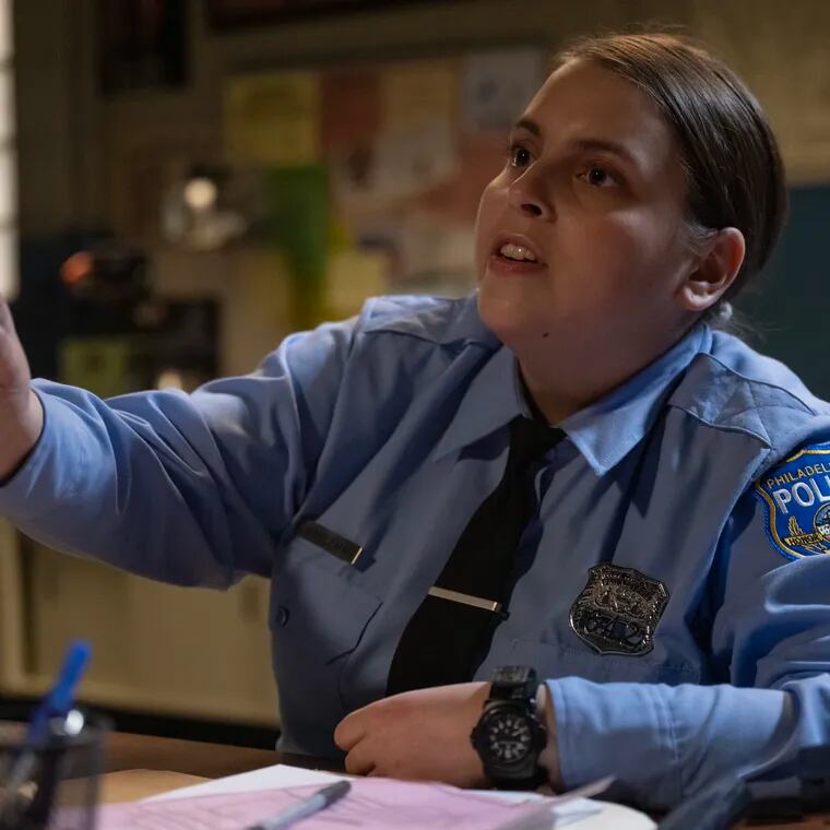 Beanie Feldstein stars as Philadelphia cop Sukie in 'Drive-Away Dolls,' a lesbian comedy out in theaters on Feb. 23, 2024. Credit: Wilson Webb / Working Title / Focus Features