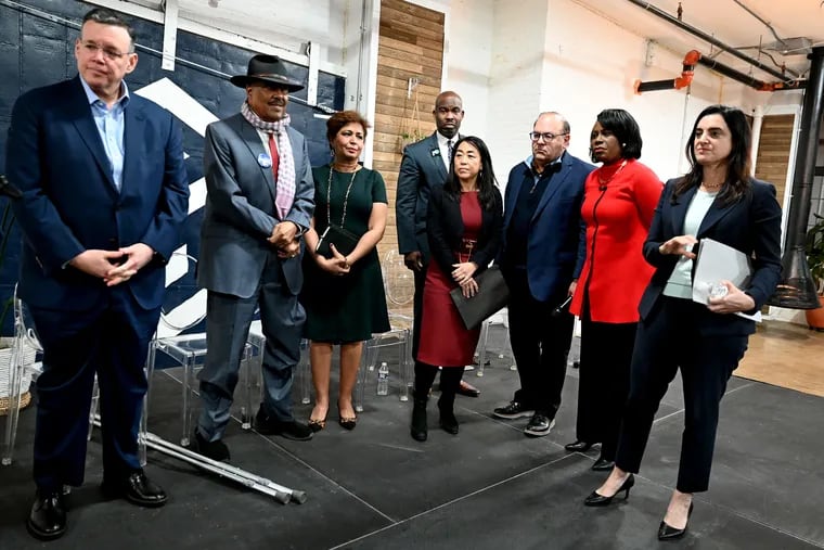 Eight mayoral candidates at a forum in January. From left are grocery store owner Jeff Brown; retired Municipal Court Judge James DeLeon; former City Councilmembers Maria Quiñones Sánchez, Derek Green, Helen Gym, Allan Domb, and Cherelle Parker; and former City Controller Rebecca Rhynhart.