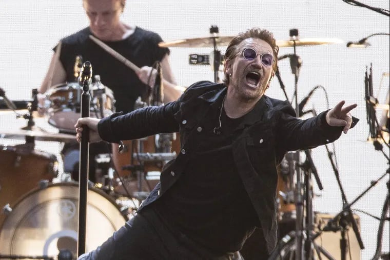 Bono with U2 on stage at Twickenham Stadium in London.