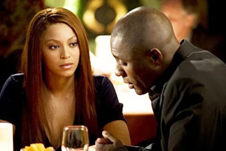 Beyonce Knowles and Idris Elba star in "Obsessed."