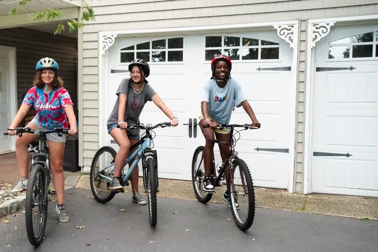 Anisa, 11; Sandrine, 14; and Nadira, 14 during a Fresh Air Fund Friendly Towns visit in Middletown, N.J.