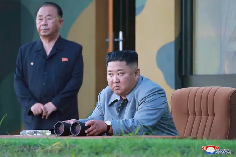 In this July 25, 2019, photo provided on Friday, July 26, 2019, by the North Korean government, North Korean leader Kim Jong Un watches a missile test in North Korea. North Korea on Saturday, Aug. 10, 2019, extended a recent streak of weapons display by firing projectiles twice into the sea, according to South Korea's military.