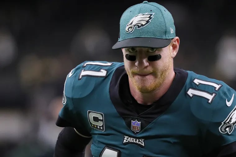 Eagles Carson Wentz jogs off the field after the Eagles lose 48-7 to the New Orleans Saints in New Orleans, LA on November 18, 2018. DAVID MAIALETTI / Staff Photographer