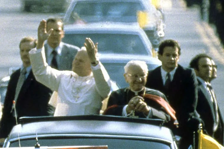 Pope John Paul II and motorcade during the last papal visit to Philadelphia, in 1979. (File)