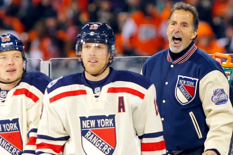 New York Rangers coach John Tortorella, right, argues a penalty in the 2012 Winter Classic against the Flyers at Citizens Bank Park.