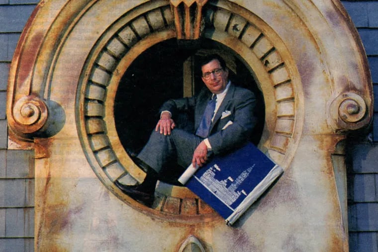 Mr. Myers poses at City Hall for an Inquirer photo shoot in 1993.