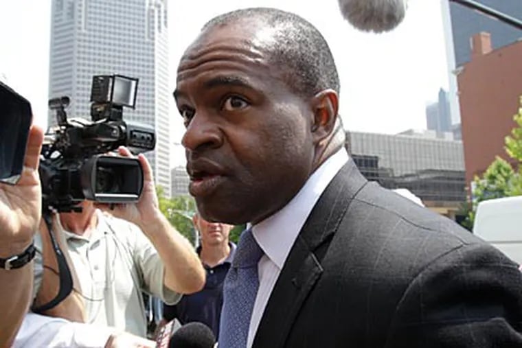 DeMaurice Smith, executive director of the NFL Players Association, leaves the federal courthouse on Friday. (Jeff Roberson/AP Photo)