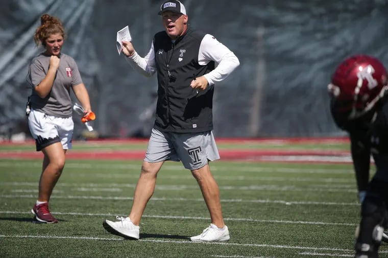 Owls football coach Geoff Collins motions to his players during Temple University football practice in Philadelphia, PA on September 4, 2018. DAVID MAIALETTI / Staff Photographer