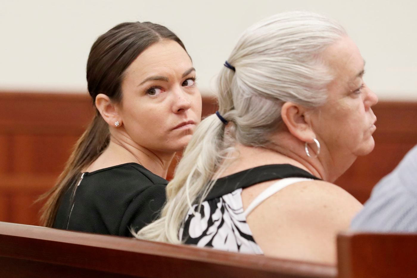 Tara Tolomeo (left) and her mother, North Wildwood councilwoman Kellyann Tolomeo, look around as they wait to appear in Sea Isle City municipal court. Nora Kenney, the daughter of Philadelphia Mayor Jim Kenney, and Tara Tolomeo, the daughter of North Wildwood Councilwoman Kellyann Tolomeo both plead guilty to the charge of creating a disturbance.