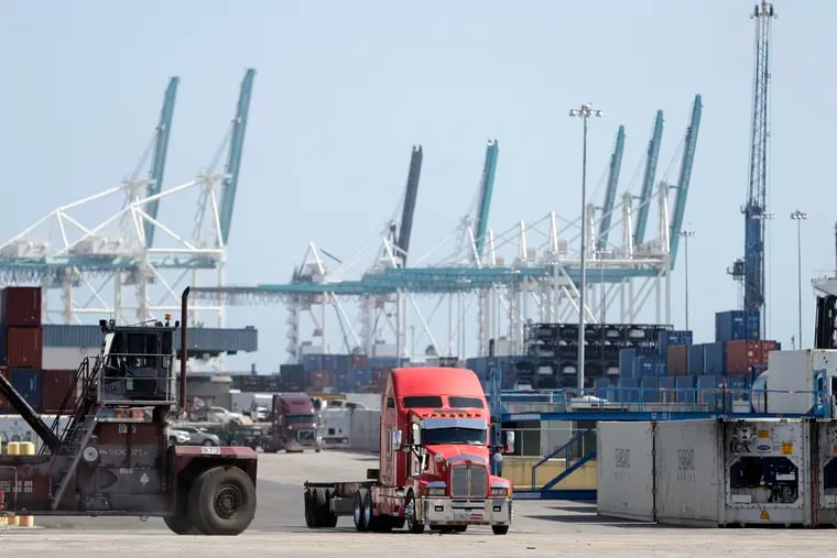 A truck leaves the docks at PortMiami in Miami.