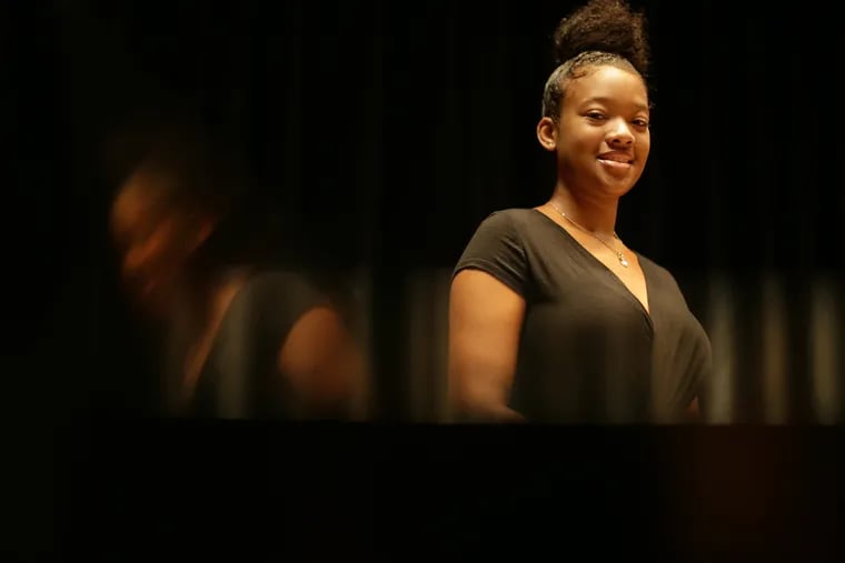 Aliyah Taylor, 18, of West Philly, poses for a portrait at the Philadelphia Clef Club of Jazz & Performing Arts.