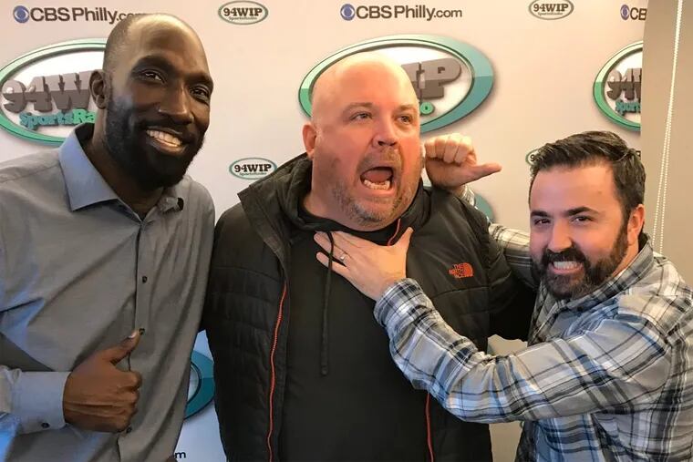 At WIP, evening host Jon Marks (right) will join Ike Reese (left) in the afternoon, replacing departing host Chris Carlin (center).