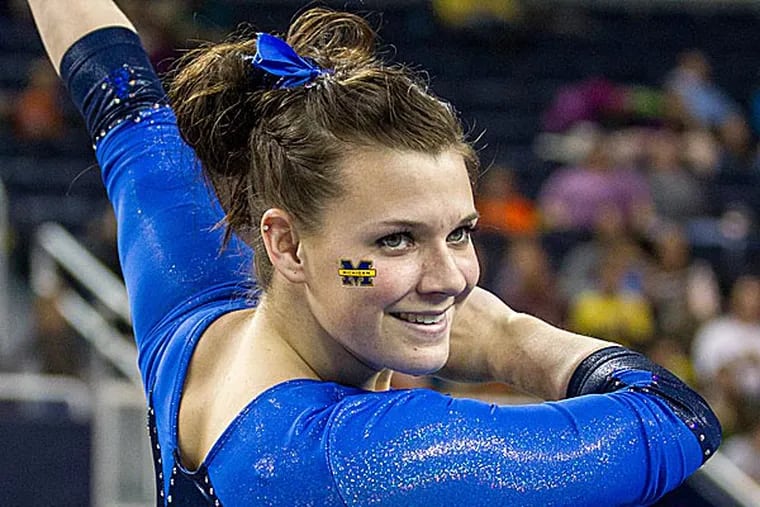 With practice and consistency, Joanna Sampson has the ability to win an all-around national title as a senior in 2014. (Photo via the University of Michigan)