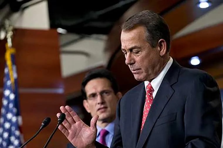 FILE - In this Friday, Dec. 21, 2012, file photo, speaker of the House John Boehner, R-Ohio, joined by House Majority Leader Eric Cantor, R-Va., left, speaks to reporters about the fiscal cliff negotiations at the Capitol in Washington. Lawmakers probably could enact a compromise quickly and easily if Republican leaders let Democrats provide most of the votes.  By trying to pass his plan with GOP votes alone, Boehner could afford to lose only two dozen of the 241 House Republicans. His private head-count found nearly twice that many defectors, party insiders say, forcing Boehner to give up without seeking a formal vote. (AP Photo/J. Scott Applewhite, File)