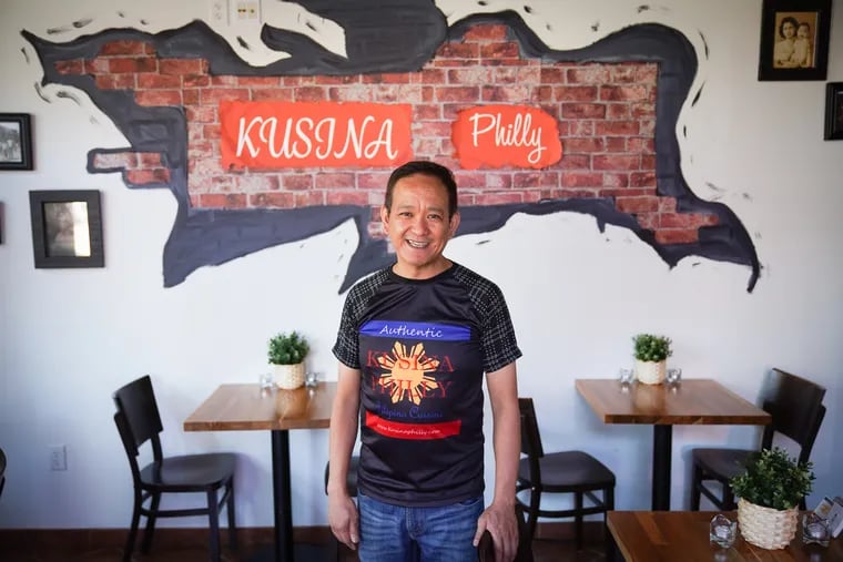 Cesar Gonzales at his restaurant Kusina Philly on Woodland Ave. in West Philadelphia. Gonzales works full time, and runs several businesses that each have a community outreach and advocacy component.