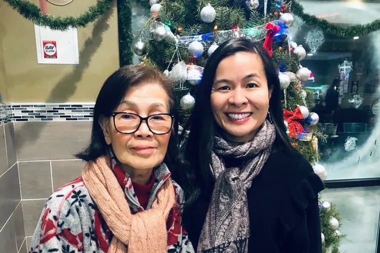 Oanh Meyer, pictured with her mother, Anh Le, is an associate adjunct professor at the Alzheimer's Disease Center at the University of California-Davis, where she is studying the possible correlation between war trauma and dementia by following more than 500 Vietnamese elders in Northern California. Meyer wonders whether her mother's dementia is linked to the terror she suffered during the Vietnam War.