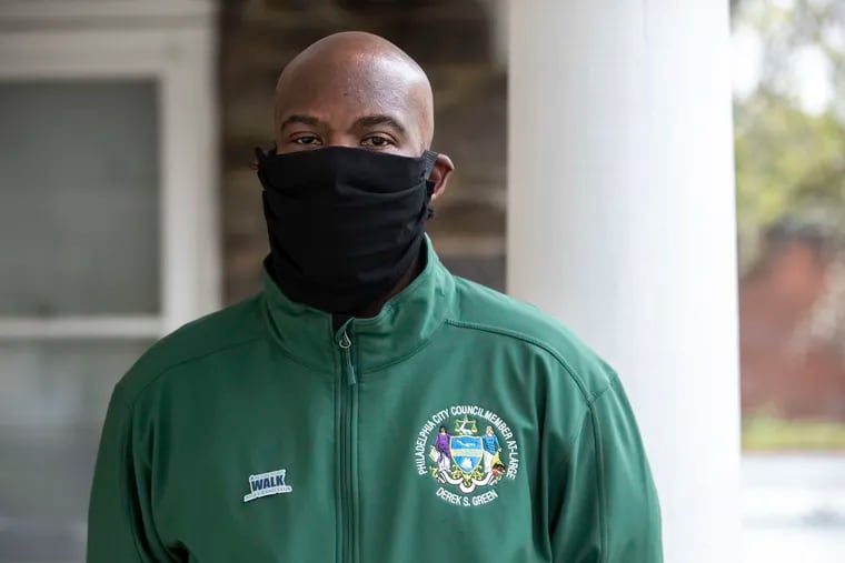 Philadelphia City Councilmember Derek S. Green posed for a portrait wearing a homemade face mask in front of his home in Philadelphia, Pa. on Monday, April 13, 2020.