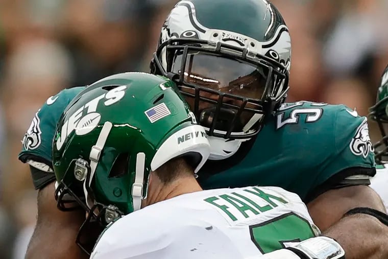 Eagles defensive end Brandon Graham sacks Jets quarterback Luke Falk during the third quarter on Sunday.
