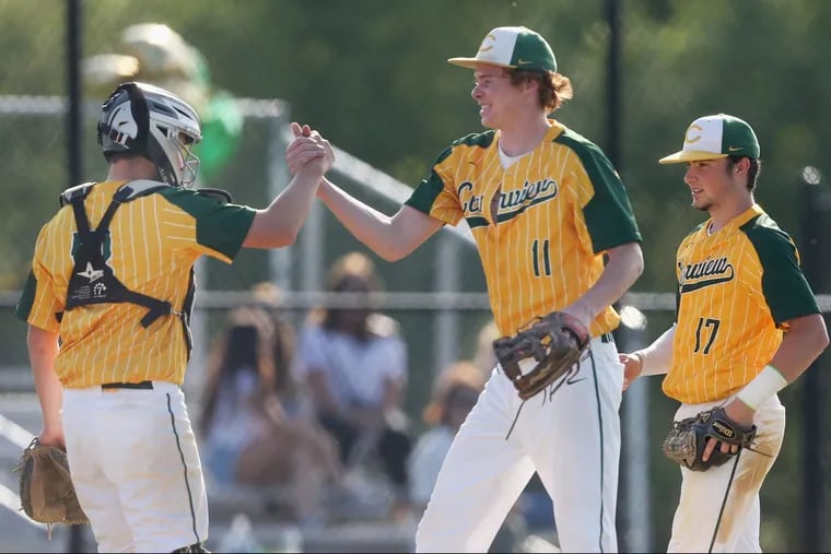 Clearview’s Ryan Gioia (18) and Daniel Sullivan (11) celebrate after Robert Gallagher (17) made the final tagout to end their game against Gateway at Clearview Regional High School in Mullica Hill, N.J., on Wednesday, May 23, 2018. Clearview won 7-1.