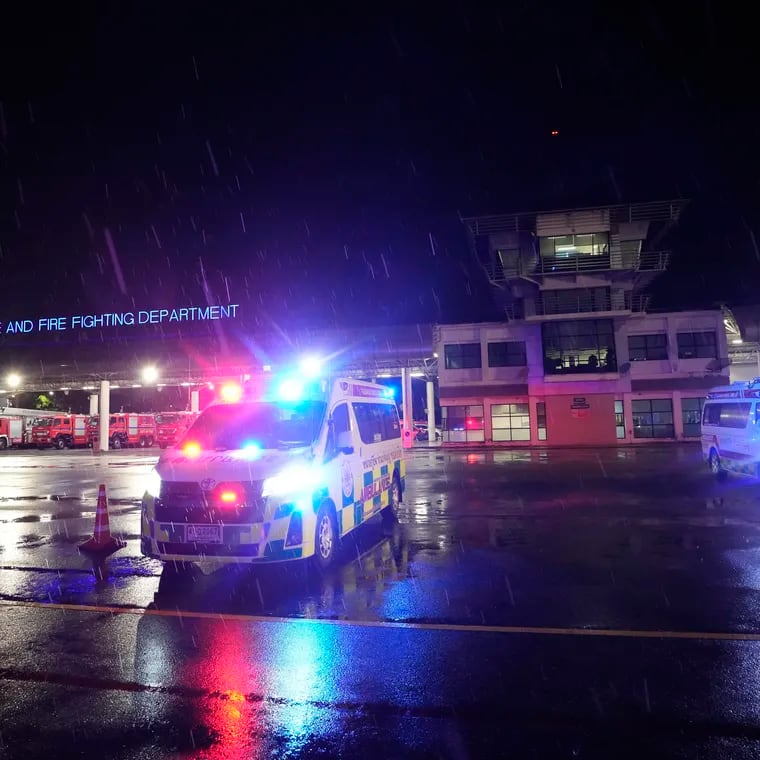Ambulances are seen at the airport in Bangkok, Thailand, where a London-Singapore flight that encountered severe turbulence was diverted to on Tuesday, May 21, 2024.
